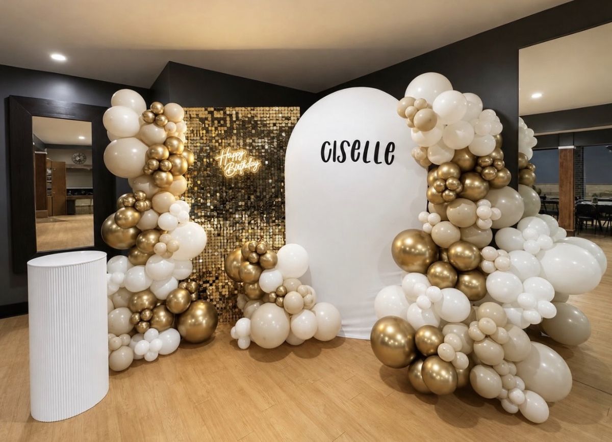 White and chrome gold balloon garlands around a gold sequin wall with a neon Happy Birthday sign